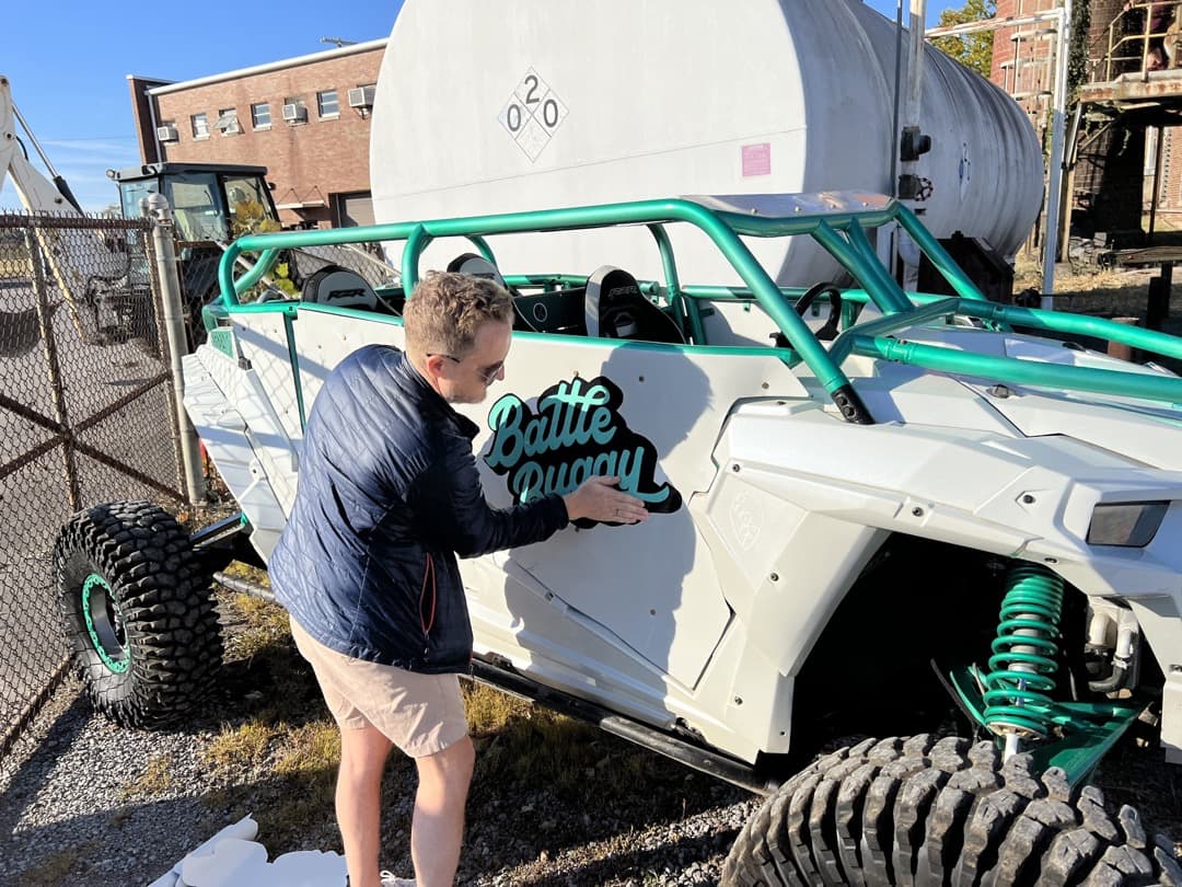 Behind the scenes photo 43 from Clone Cops production showing vfx supervisor charles royce prepares the battle buggy